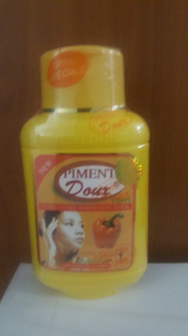 Lait de beauté eclaircissant piment doux anti tâches aux accides de fruits et vitamine